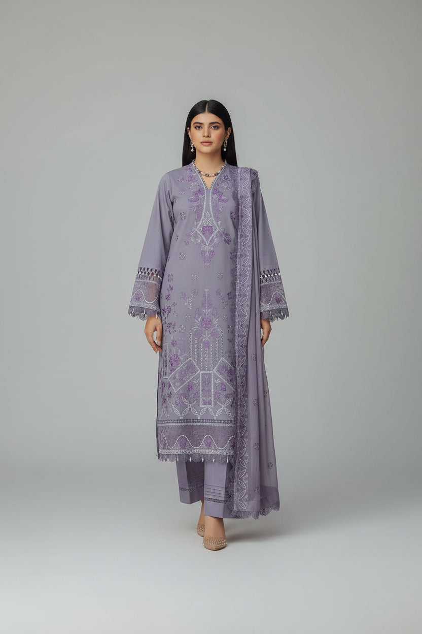 Kumash festive collection advertisement with a woman wearing a purple embroidered outfit.