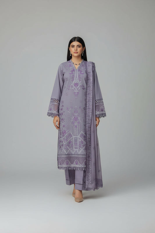 Kumash festive collection advertisement with a woman wearing a purple embroidered outfit.